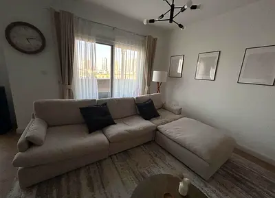 Home Center swin feather filled sofa with footstool