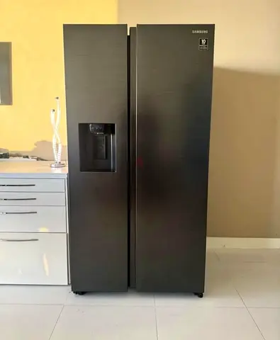Samsung latest model side by side refrigerator for sell with water dispenser good working