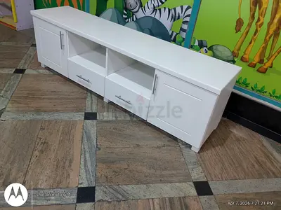 Moving out Sale! used tv unit stand in very good condition Available For sale.Free delivery all uae