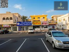 Premium Commercial Villa | G+1 | 5 Shops + 4BR | On Main Road | Easy Access to Dubai &amp; Sharjah |