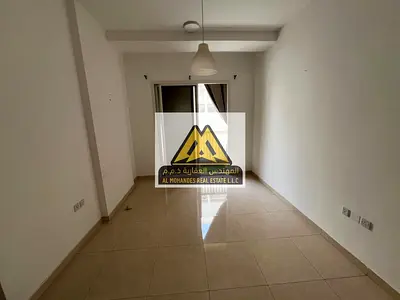 Special offer: One-bedroom apartment for rent in Al Alia, Ajman, with a spacious living area, two bathrooms, and a distinctive balcony, at a competiti