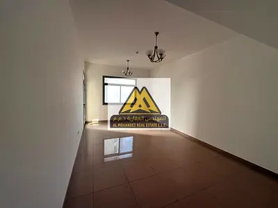 Two bedrooms and a living room in Al Rashidiya 1, a very prime location at a reasonable price, with a large area and a balcony with an open view of a