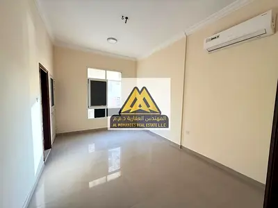 A great opportunity to rent a spacious 1-bedroom apartment in Al Alia, Ajman. unit features a large layout, split AC, and a balcony, located in a