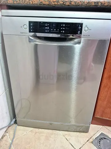 Stainless steel freestanding dishwasher - good condition, 8 years old