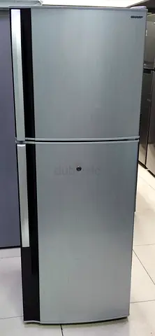 Used upright refrigerator - good working condition