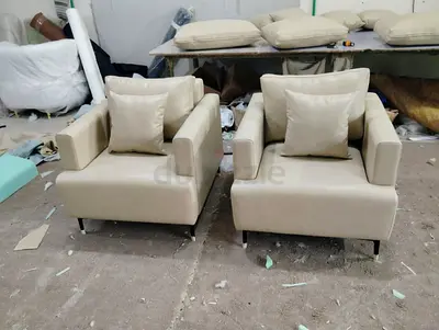 Pair of Beige Upholstered Armchairs witg Coushion
