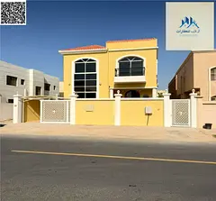 Villa for sale in Ajman – Al Rawda 2 area, prime location on a corner lot, very close to Sheikh Am