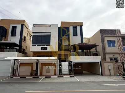 Luxury villa in Al-Haliou 2, two floors and a roof, 5 master bedrooms, price includes air conditioning, electricity, water, and freehold ownership.