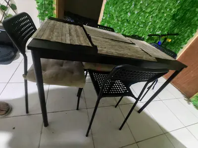Wooden-top Dining Table with 4 Black Chairs - Compact Set