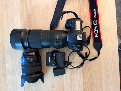 1.	Canon 6D Mark II + Sigma 24-70mm  100-400mm Lens Bundle — Dubai