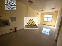 Studio apartment for rent in Al Jurf, Ajman, with a very large area and a semi-separate kitchen, loc
