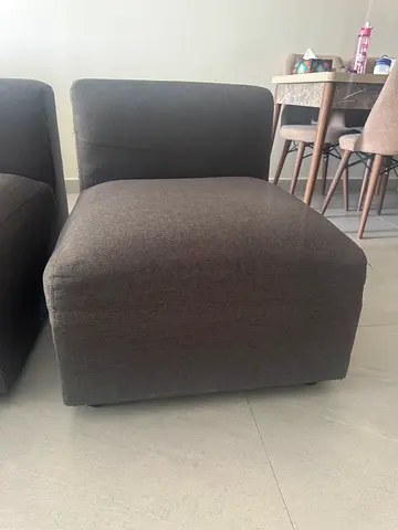 2 sofas Grey upholstered armless lounge chair / modular seat - good condition