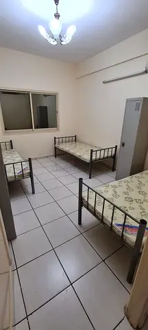 Bedspace for male near strawberry corner Al hamriya