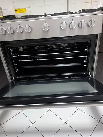 Stainless Steel Gas Range with Oven - Good Working Condition