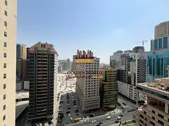 Three-bedroom apartment with a living room (back-facing layout) in Al Taawun, featuring a balcony, m