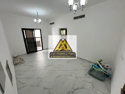 One bedroom and living room for annual rent - brand new building - 2 bathrooms with modern finishes - bright apartment with natural light