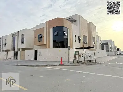 Villa for sale in Ajman Corner | Al Helio 2 area | 6 bedrooms, majlis, 2 living rooms, and roof terrace | Freehold | Price includes registration fees