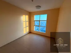 For rent in City Tower, Ajman: 2 bedrooms and a living room, 2 bathrooms, American-style kitchen, ba