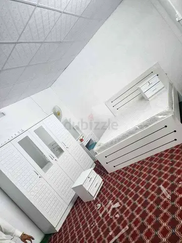 White bedroom set – bed, wardrobe and bedside table