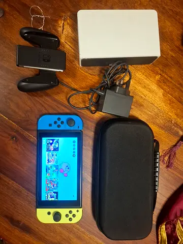 Nintendo Switch V2 Console with Neon Joy‑Cons (Blue/Yellow) - Good Condition