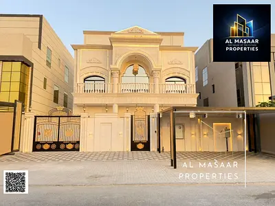 Opportunity to own a two-story villa in the most prestigious area of Ajman, with a rooftop, internal elevator, electricity, and water directly on th