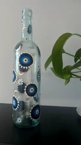 Decorative Hand-Painted Glass Bottle with Blue Evil Eye Motif