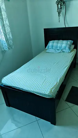 Single bed with IKEA spring mattress
