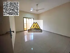 Two-bedroom apartment for rent in Al Nuaimiya, Ajman, with a spacious layout, two balconies, open vi