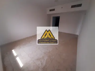 1-Bedroom Apartment for Annual Rent in Al Naeemiyah 2 Ajman on Main Street Spacious Layout Bathroom Wall Cabinets Central AC