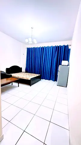 Spacious furnished master bedroom with attached washroom and balcony