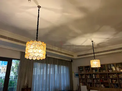 Pair of Decorative Pendant Ceiling Lamps - Crystal-like Shades. AED 1000 each.
