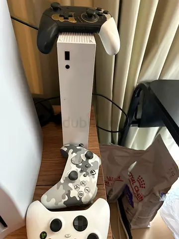 Xbox Series S console with three controllers (white, camo, black) - good working condition