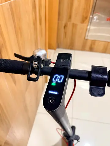 Electric Scooter — Lightly Used with LED Display and Bell