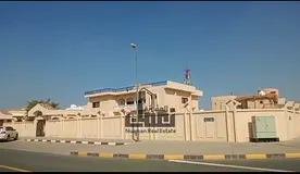 Luxury Corner Villa for Sale in Al Khuzamia – 10 Master Bedrooms | Huge Plot