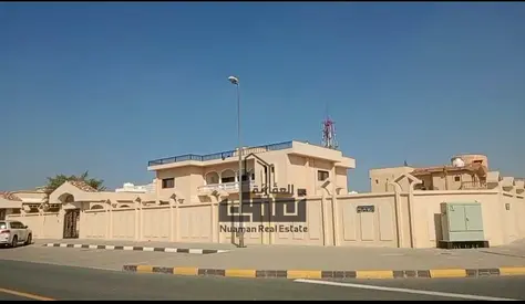 Luxury Corner Villa for Sale in Al Khuzamia – 10 Master Bedrooms | Huge Plot