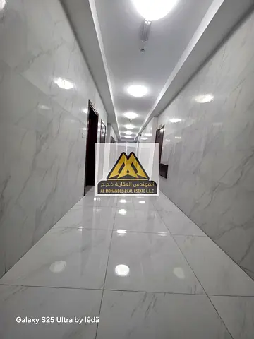 One bedroom and living room with balcony, central air conditioning, distinctive natural lighting, and shower enclosure.