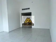 Large studio in Falcon Towers, Al Rashidiya 2, Ajman. Separate kitchen, built-in wardrobes, central