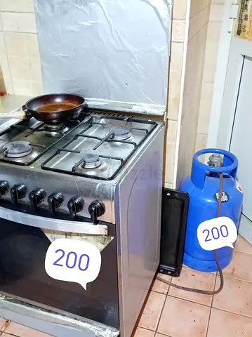 Used 4-Burner Gas Stove with Oven + Gas Cylinder - Functional