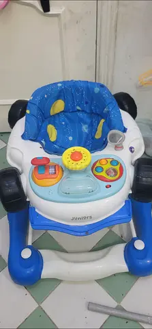 Baby walker with activity tray and music — good working condition
