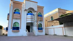 Villa for sale in Al Rawda 3, 5 bedrooms, hall &amp; majlis, maid room, 5000 sq.ft, luxury finish, i