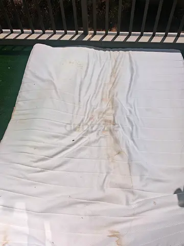 Free Used double mattress with stains — needs cleaning only. Good condition otherwise.