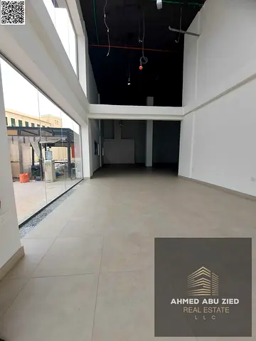 Commercial space for annual rent in Ajman, Al Rawda 2, 2200 sq ft, with private bathroom, priced at AED 300,000 negotiable, payable in 4 installments.