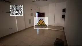 Studio apartment for rent in Al Rawda 2, Ajman, with a large area and a semi-separate kitchen, insid