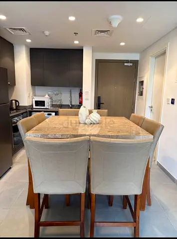 Marble-top Dining Table with 8 Upholstered Chairs
