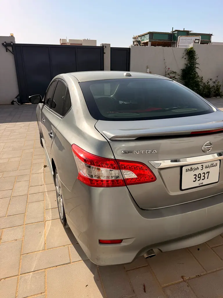 Nissan Sentra 2014 — photo 1 of 15