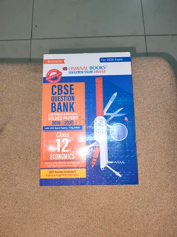 Oswaal grade 12 economics guide