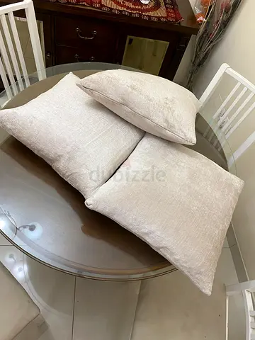 Feather filled branded cushions
