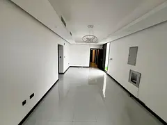 For annual rent: Two bedrooms and a living room, rooftop apartment in Al Jurf 3, behind the Chinese