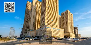 Two-bedroom apartment with a spacious living room in Emirates City, with parking and gym.