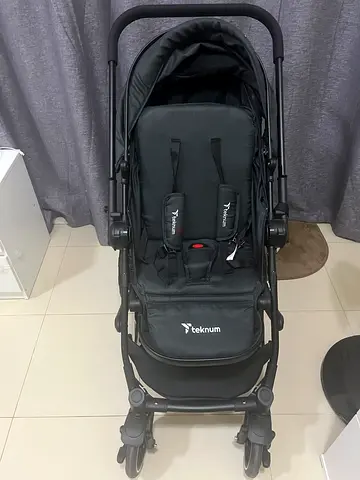 Teknum reversible moonwalk baby stroller in excellent condition